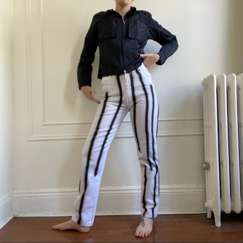 Eckhaus Latta classic El jeans in white with spray paint pinstripe.